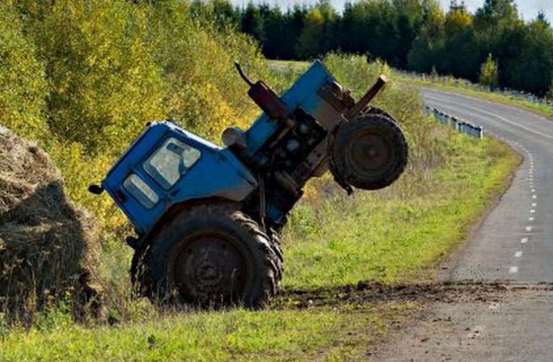 Тракторы, управляемые рядом идущим водителем.